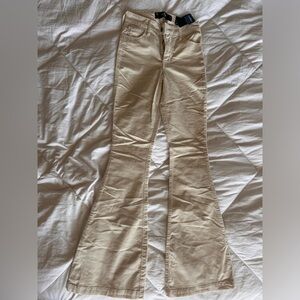 Cream Hollister bootcut flare corduroy pants. Have never been worn